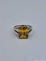 Front view showing square citrine gemstone set in sterling silver band