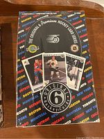 Front cover of the sealed Original Six hockey card set package showing sample hockey card images and branding.