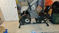 Side view of Schwinn Journey 2.0 recumbent bike showing entire frame, seat, pedals, and console area.