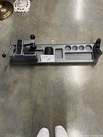 Top-down view of the Cabela's Shooters Vice Rest showing compartments and tightening knobs.