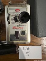 Kodak Brownie 8mm Movie Camera showing front and manual exposure settings