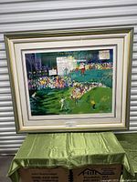 Framed lithograph full view on green drape