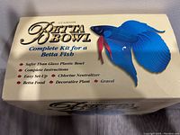 Front view of the Betta Bowl 1/2 gallon complete kit box emphasizing the colorful betta fish image and features.