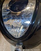 Close-up of the front panel showing Zokop logo and model details on the black air fryer.