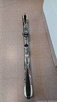 Top view of one ski showing Rossignol branding and Hero 3 label, white and black with red accents.