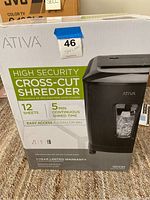 Box showing front and side with product features and branding.