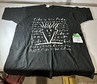 Full front view of the vintage black Fido Dido T-shirt showing the printed graphic and overall condition.