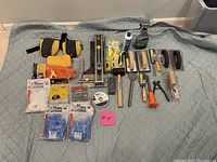 All tools laid out on quilted pad