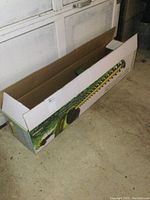 Original Sun Joe electric pole and hedge trimmer packaging box empty interior shown.