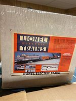 Front of sealed Lionel Electric Trains Amtrak Work Train box showing locomotive and cars artwork