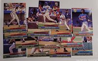Photo showing 13 individual 1992 Fleer Ultra baseball cards featuring notable players such as Eddie Murray, Sammy Sosa, Andre Dawson, and others, arranged on a flat surface.