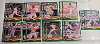 Photo showing 18 different 1991 Donruss National League All Stars baseball cards laid out in rows on a flat white surface.