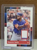 Front of the Dominic Smith baseball card showing player image, Donruss and 22 logo, and game-used material insert