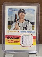 Front of 2020 Topps Heritage Clubhouse Collection Relic card featuring DJ LeMahieu in New York Yankees uniform with embedded fabric piece.
