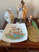 Overview of all six items on wooden table