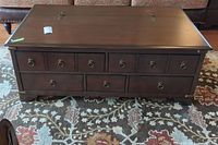 Front view showing five drawers and ring pulls