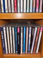 Photo showing first row of CDs including BB King, Kenny G, Patti LaBelle, various jazz and blues albums.