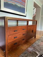 Left front perspective of wooden server showing drawers, cabinet and open shelf with black hardware