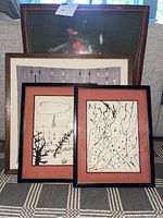 Overview of all four framed art pieces grouped together showing size and style differences