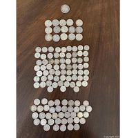 Entire set of coins arranged in rows