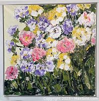 Front view of the painting showing a colorful floral arrangement with pink, yellow, purple, and white flowers