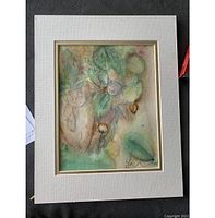 Close-up of the watercolor artwork inside cream double mat, showing signature and detail of painting