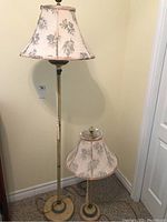 Full view of both lamps showing size difference and wear on lamp bases and shades