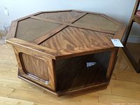 Top angled view showing octagonal shape and cane inserts on table surface