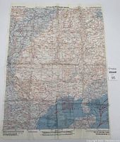 Full view of one silk cloth map showing French Indo China area with detailed routes and topographic markings.