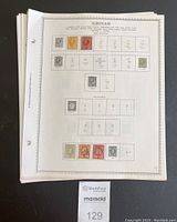 Single album page showing a variety of Surinam stamps mounted with printed catalog numbers and placeholders.