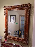 Full frontal view of the rectangular mirror hung on wall