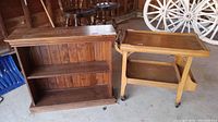 Solid wood bookshelf and bar cart side by side showing structure and shelves.