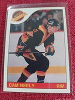 Hockey card photo showing player Cam Neely in Vancouver Canucks uniform.