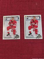 Two Nicklas Lidstrom 1992 Upper Deck Rookie Report hockey cards side by side, showing front image of player in Detroit Red Wings uniform