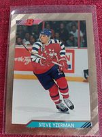 Photo of Steve Yzerman hockey card in protective sleeve showing front of card with player in Washington Capitals uniform.