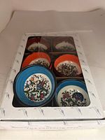 Six hand-painted decorative ceramic portion bowls with floral designs inside, arranged in a white box with printing 'LUX ÇEREZLİK SETİ Made in Turkey'