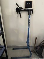 Full view of stand upright against wall