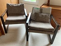 Two chairs front view showing frames and cushions