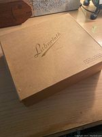 Closed wooden box with "Labyrinth" printed on top