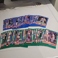 Over 40 Chicago Cubs baseball cards from the 1991 Donruss set laid out on a table showing front images of individual players.
