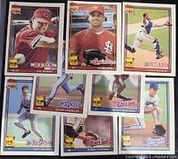 Photo showing 8 Topps All Star Rookie baseball cards in near mint condition.