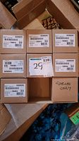 Eight Siemens ZH-MC-R strobe boxes arranged in rows inside a larger cardboard box, one labeled 'STROBES ONLY'