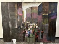 Front view of the 48x36 inch abstract cityscape painting on a white easel.
