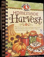 Front cover showing colorful fall-themed art including cornucopia, pumpkins, jars, and baked treats with title