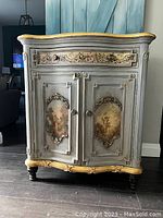 Front view of the entire cabinet showing overall finish, color, and design