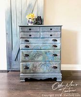 Front view of full dresser showing overall painted finish and drawer configuration.