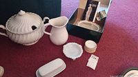 Overview of all items including butter dish, water pitcher, punch bowl, mini plates and box.