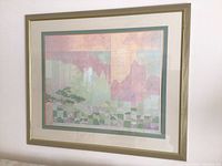 Full view of the large pastel landscape painting in gold frame on wall.