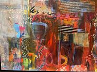 Detail of layered acrylic paint and collage elements with scripted text