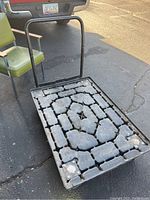 Top view of the cart showing the textured platform and handle.